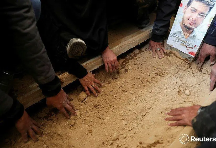  تصاویر خبرگراری رویترز از خاکسپاری شهدای حملات امریکا و اسراییل به ایران، در بهشت زهرای تهران