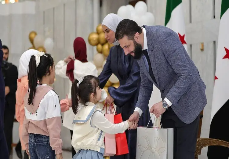 جولانی و همسرش در جشن عید فطر