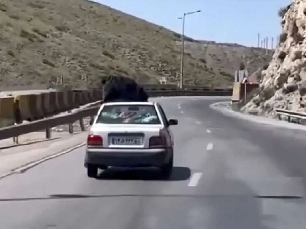 توقیف پرایدی که روی سقفش یک زن بود! + عکس
