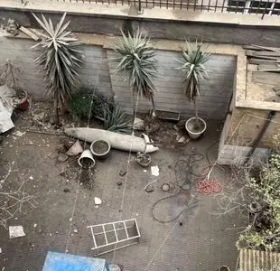 تصویری از موشک عمل‌نکرده در حیاط خانه مسکونی در تهران