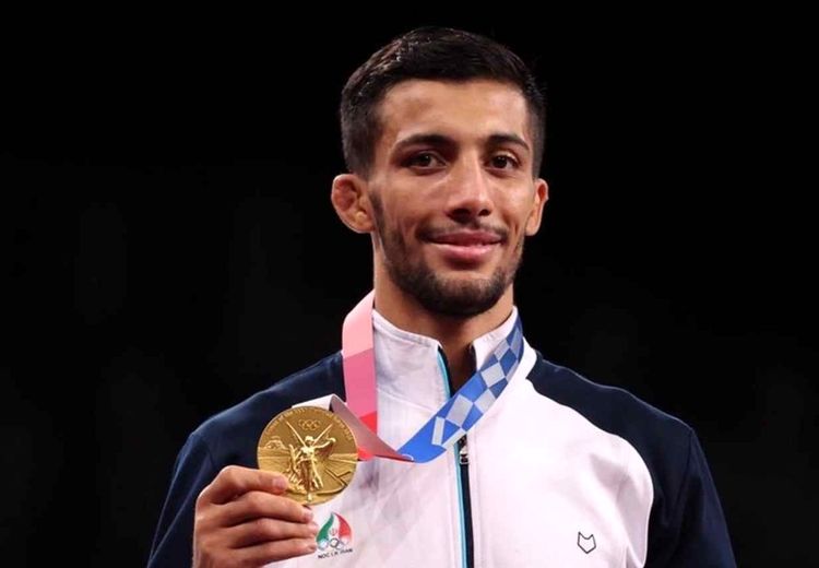 محمدرضا گرایی به قولش عمل کرد؛ اهدای مدال طلا به کودک معلول شیرازی