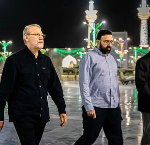 تصویر علی لاریجانی، فرزند و محافظش