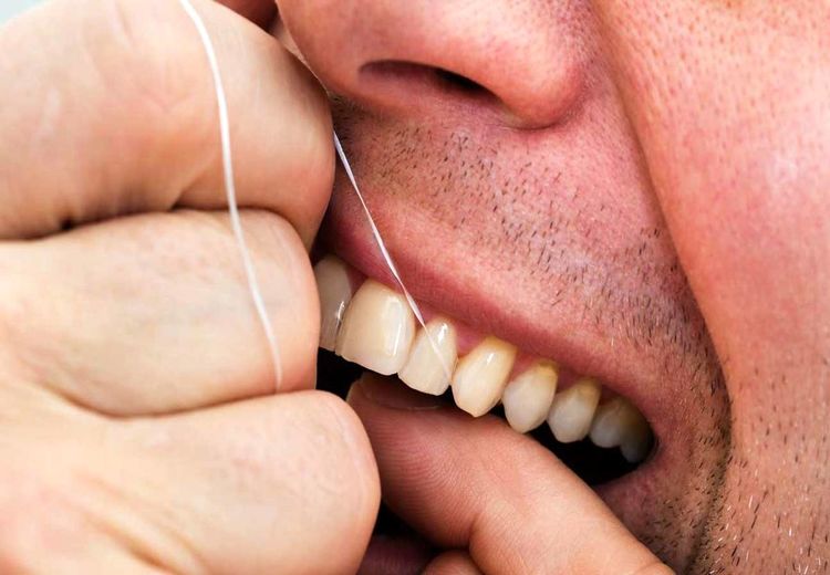 نخ دندان فایده دارد یا ندارد؟